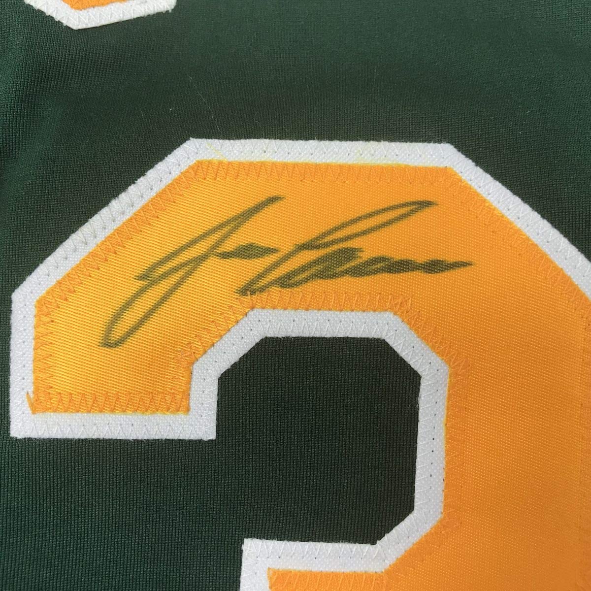 Autographed/Signed Jose Canseco Oakland Dark Green Baseball Jersey JSA COA